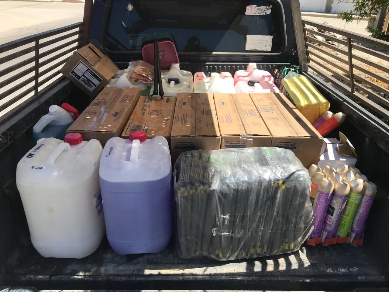 The delivery truck loaded with drums, paper goods and boxes before a route run